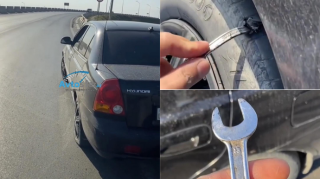 Yola atılan qaz açarı təkəri deşdi; Sürücü və sərnişin son anda qəzadan xilas oldu - VİDEO 