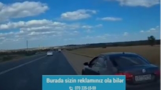 Yolda "qoçuluq"  etmək istəyən sürücünün həzin sonu  - VİDEO