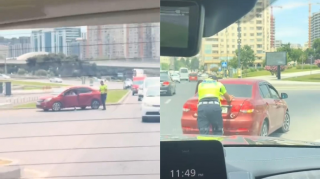 Polis nasazlıq yaranan maşını itələyib yoldan çıxarmağa kömək etdi - VİDEO 