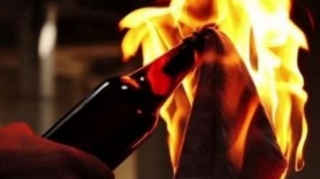 Rusiyalı qadın “Molotov kokteyli” ilə hərbi komissarlığı yandırmağa cəhd etdi