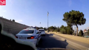 Yol polisi rəisin maşını ilə "protiv" getdi: CƏZALANDIRILDI - VIDEO