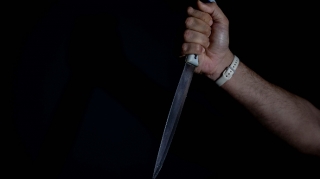 Yeyib-içmək məclisində qadına 16 bıçaq vurdu