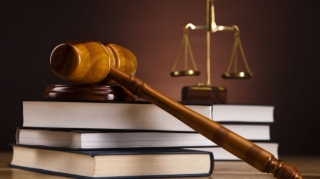 Axund dəfnə görə cərimələndi, məhkəmə cəzanı ləğv etdi 