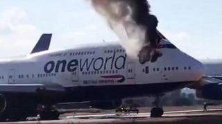 İkimərtəbəli sərnişin təyyarəsi alovlara büründü  - VİDEO