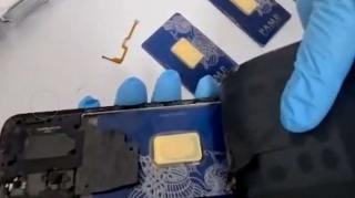 Mobil telefonda qızıl külçələr gizlədildi 