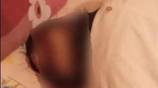 Arvadının baltalayıb öldürdüyü məmur oğlunun görüntüləri - FOTO 