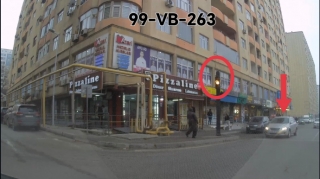 Sarı işığın mənasını bilməyən sürücü 100 manatlıq qayda pozdu - VİDEO