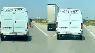 В Азербайджане наказан пассажир, свесивший ноги из окна автомобиля – ВИДЕО 