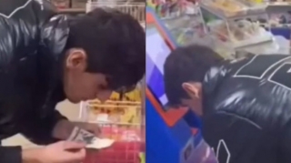 Pulun üzərinə tüpürərək ödəniş edən gənc polisə çağırıldı - VİDEO 