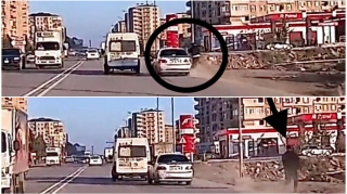 Bakıda ötmə edən sürücü maşını piyadanın üzərinə sürüb  təhlükə yaratdı   - VİDEO