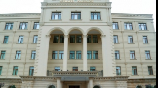 Zakir Həsənov hərbçiləri təbrik edib 