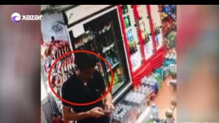 Bakıda mağazada oğurluq anbaan kameraya düşdü - Belə oğurluq görməmisiniz - VİDEO