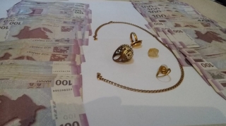 İsmayıllıda elektron qolbaq daşıyan şəxs evdən 18 min manat pul oğurlayıb - FOTO