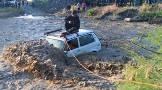 В Хачмазском районе спасли водителя застрявшего в реке автомобиля - ВИДЕО - ФОТО