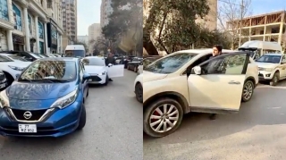 Qəza işıqlarını yandırıb maşını yolun ortasında park etdi; yolu bağladı    - VİDEO