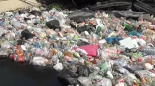 Bakıda dəhşətli mənzərə: Zibillər niyə kanala atılır? - VİDEO  