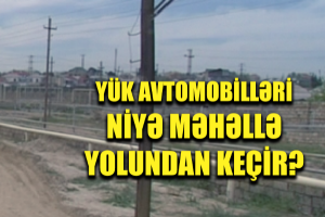 Bakıda ağırtonlajlı maşınlar evlərə ziyan vurur - VİDEO