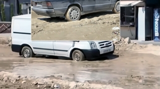 "Dizə kimi palçığın içində evə gedirik" – Bakıda yol problemi - VİDEO 