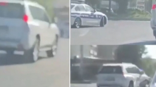 В Баку водитель Prado с "зеркальным"  номером нарушил правила на глазах сотрудников полиции  - ВИДЕО