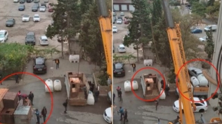 Bakıda binaların üstündəki çənlər yenidən yığışdırılır  - VİDEO