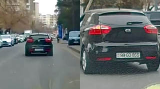 Xanım sürücü avtomobilindəki kağız parçalarını yola səpələdi - 99-GO-866    - VİDEO