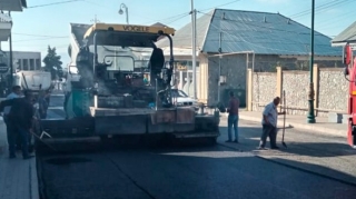 Oğuzun 14 küçəsində yollar təmir olunur - FOTO 