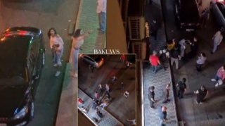 Bakıda qız gecə vaxtı dəyənəklə polisə hücum etdi - ANBAAN VİDEO 