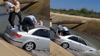 Автомобиль упал в канал на трассе Худат - Баку:  семью удалось спасти в последний момент - VİDEO 