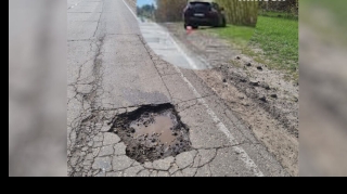 “Porsche Cayenne”nin sahibi çuxura görə yol idarəsindən 17 min manat aldı   - FOTO