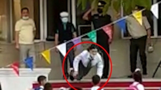 Təhsil Nazirliyindən himn zamanı yıxılan xanımla bağlı AÇIQLAMA 