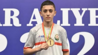 On altı yaşlı boksçu sınaq döyüşü zamanı ölüb 