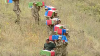 Kəlbəcərdə Başlıbel qurbanlarının məzarları açıldı - VİDEO 