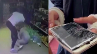 Qadın ona sataşan kişini telefonuna çəkdi: Amansızcasına döyüldü - VİDEO 