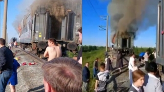 В России неизвестные подожгли вагон поезда с пассажирами  - ВИДЕО - ФОТО