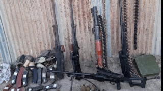 Polis əməkdaşları silah-sursat  aşkar etdilər