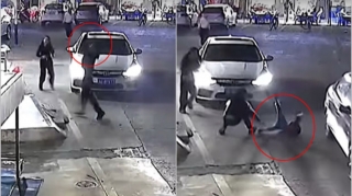 Çində kişi pəncərədən yıxılan uşağı havada tutdu - VİDEO 