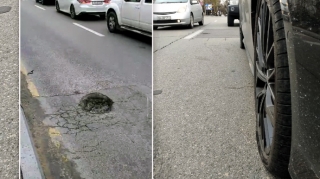 Bakıda "Audi" yolda yaranan çuxura düşdü - İki təkəri partladı - VİDEO 