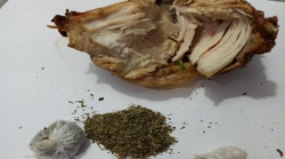 Bakıda qadının təxridxanadakı oğluna "patı" ötürməsinin qarşısı alınıb  - FOTO