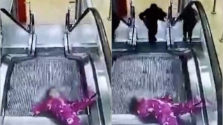 Rusiyada nəzarətsiz qalan uşaq eskalatorda ilişdi: Həyəcanlı anlar - VİDEO 