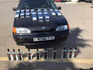 Avtomobildən qanunsuz spirtli içki və siqaret aşkarlanıb - FOTO