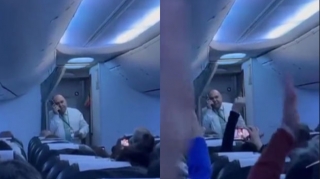 Norveç təyyarəsinin baş stüardı iranlılara şeirlə dəstək oldu - VİDEO 