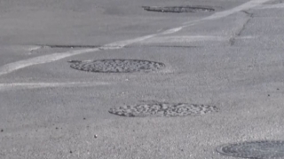 Sürücüləri bəlaya salan “lyuk”lar - VİDEO 