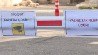 Bakıda bina sakinləri ilə sahibkarlar arasında şlaqbaum “dava”sı - VİDEO 