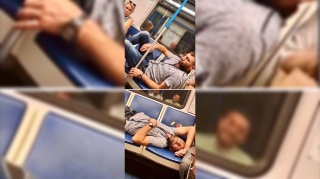 Qatarda uzanan şəxs  xanım sərnişinləri ayağa qaldırdı