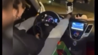 Bakıda qadın sürücü ayaqlarını qaldırıb  maşın sürdü - VİDEO