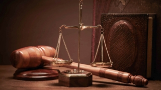 Bakıda balta ilə qətl törədib qaçan şəxsə hökm oxunub 