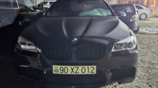 Bakıda BMW ilə "avtoş"luq  edən xanım sürücü tutuldu; 90-XZ-012 - FOTO 