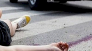 Sərxoş polis keçiddən keçən qadını vurub hadisə yerindən qaçdı - FOTO 