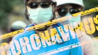 ÜST: COVID-19-a qarşı peyvənd almış insanlar yenə maska taxmalı, sosial məsafəni gözləməlidirlər 