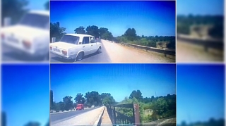 Sürücü həmkarını çaya düşmək təhlükəsiylə üz-üzə qoydu  - VİDEO